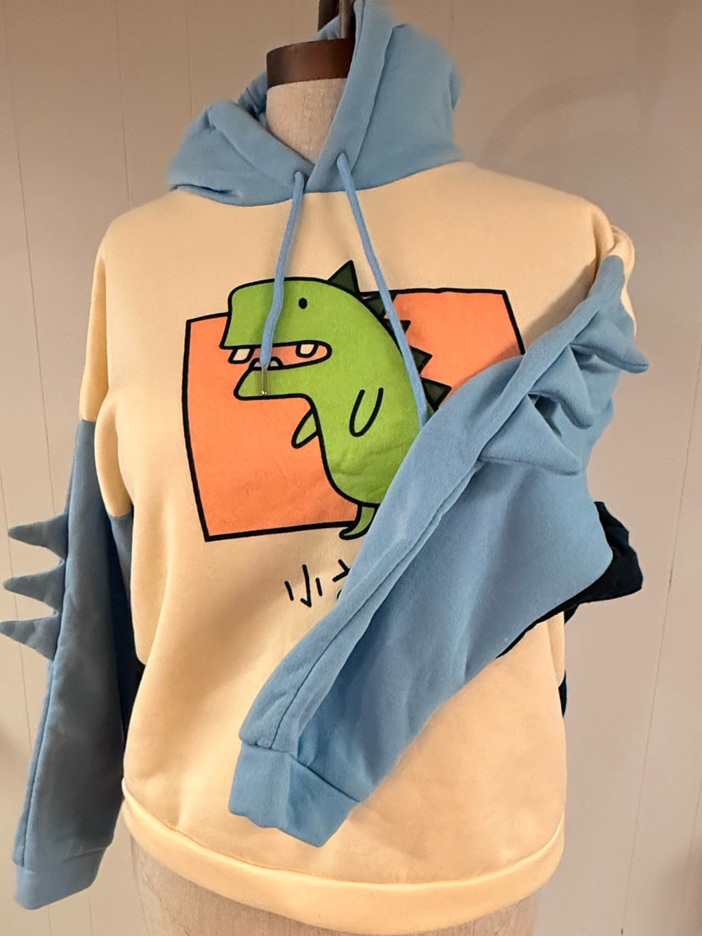 Cream & Light Blue Dino Graphic Hoodie
